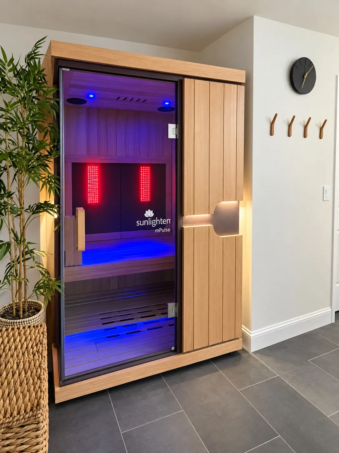 Illuminated infrared sauna integrated into a finished interior