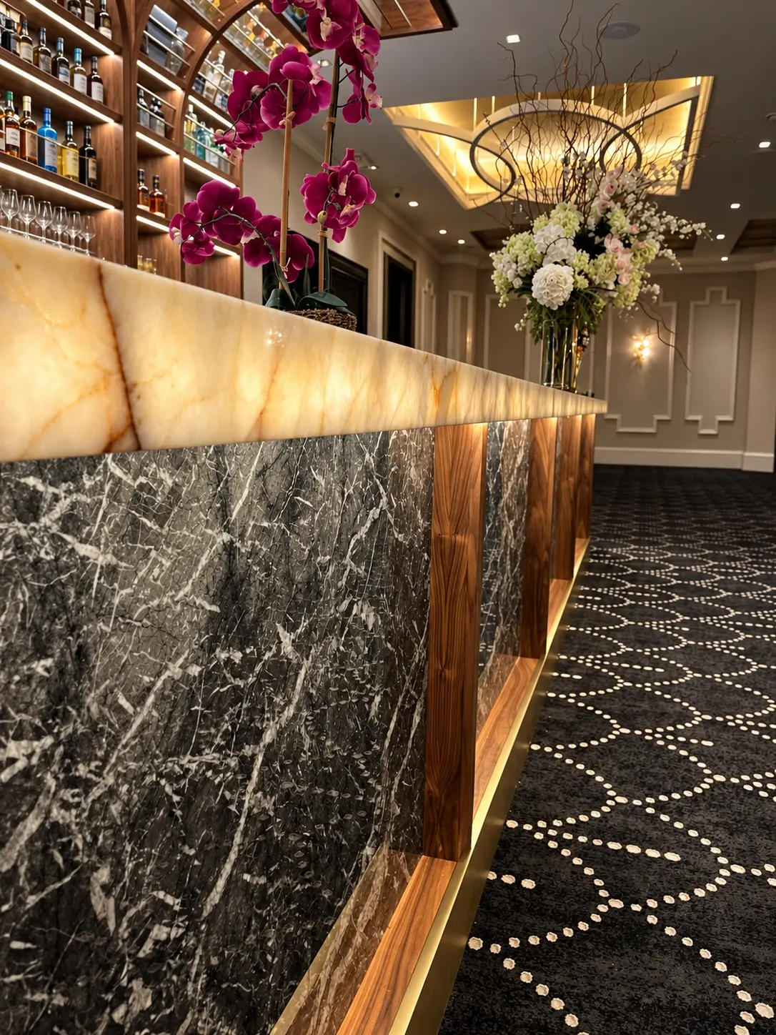 Integrated accent lighting illuminating a custom bar